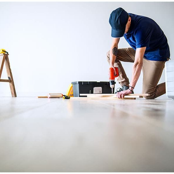 people-renovating-house-concept professional hardwood flooring installation in wichita